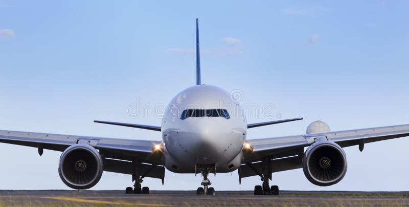 Airplane front close-up view airfield ground day time blue sky clear background. Clear closeup view stock images, royalty-free photos and pictures