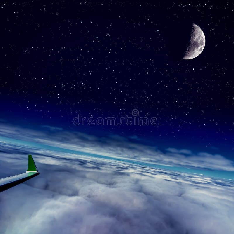 Airplane wing on flight over cloud and the moon royalty free stock photo Airplane wing on flight over cloud and the moon royalty free stock photo