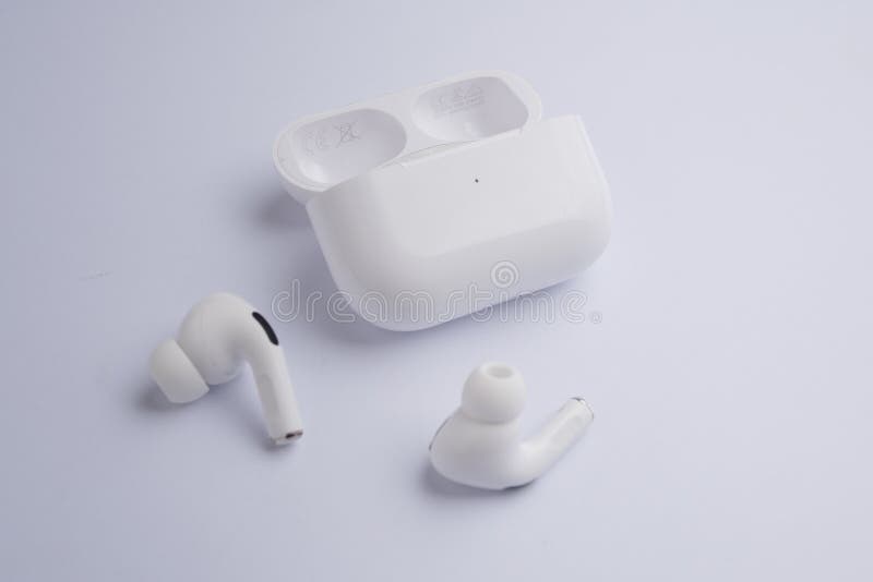 Airpods pro with case on a white background.