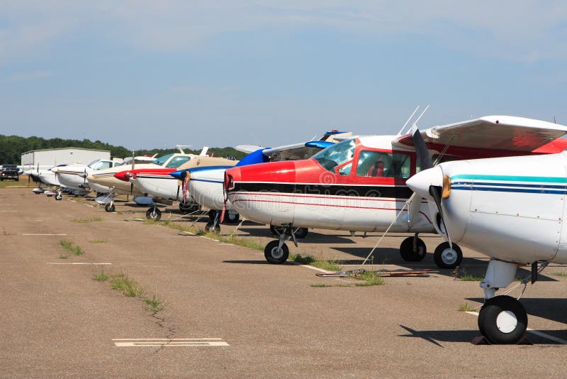 Small planes tied down at a small airport