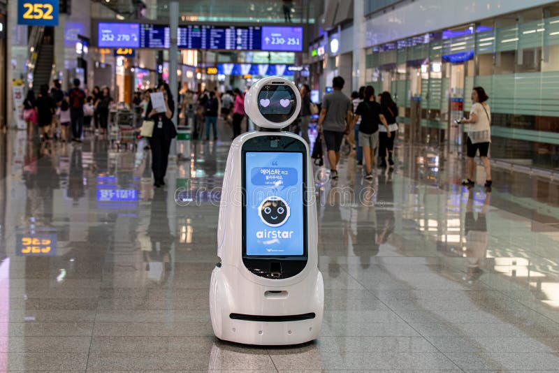 Incheon  South Korea - 14 September 2019: AIRSTAR - a passenger aiding robot at Incheon International Airport with lovely face and eyes in a shape of two hearts. Incheon  South Korea - 14 September 2019: AIRSTAR - a passenger aiding robot at Incheon International Airport with lovely face and eyes in a shape of two hearts