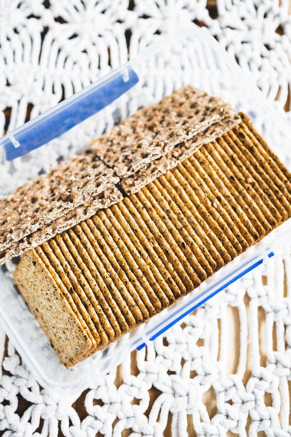 Airtight Container with Multigrain and Multiseeds Crackers in Tidy