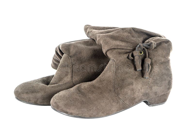 Aislante de las botas de la mujer de Brown foto de archivo libre de regalías Aislante de las botas de la mujer de Brown foto de archivo libre de regalías