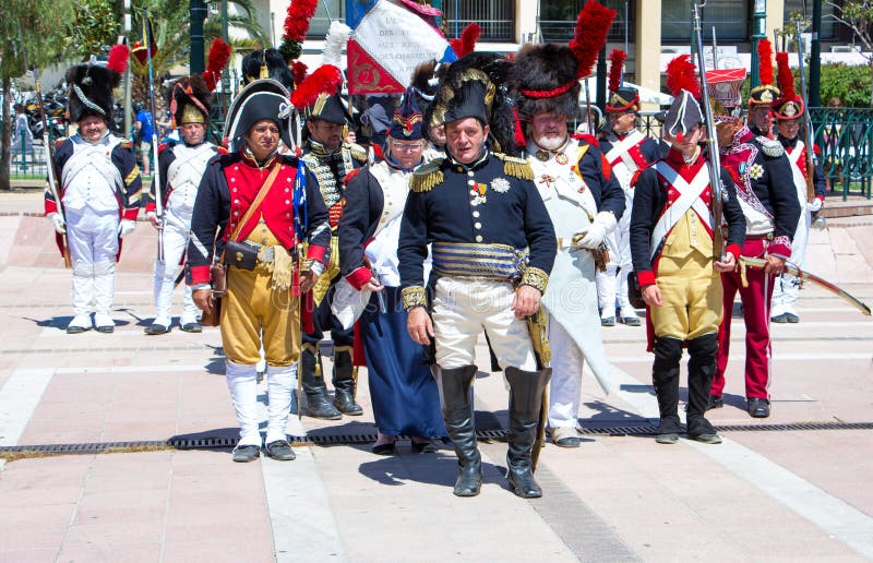 The reenactors dressed as Napoleonic soldiers for celebration the Napoleon birthday who was born in Ajaccio. royalty free stock photo