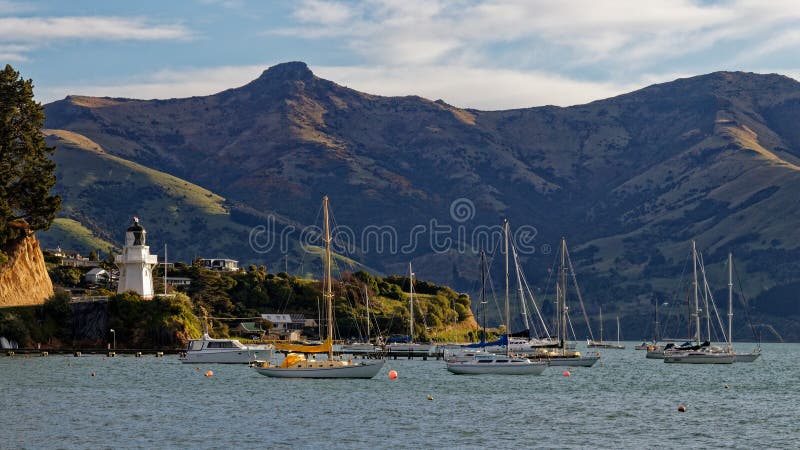 Akaroa lighthouse and harbour, Banks Peninsula, New zealand stock image Akaroa lighthouse and harbour, Banks Peninsula, New zealand stock image