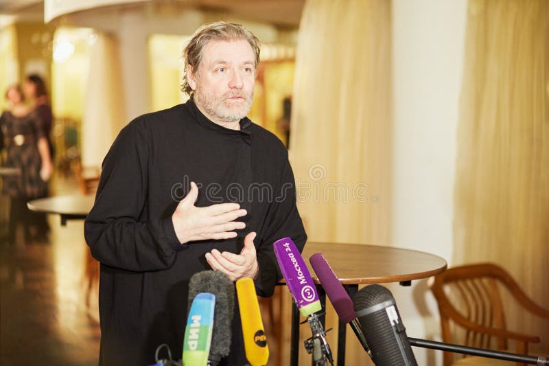 MOSCOW, RUSSIA - JAN 15, 2015: Actor V.Simonov performer of part of Boris Godunov gives interviews after media preview of Boris Godunov directed by Peter Stein at Moscow theatre Et Cetera. MOSCOW, RUSSIA - JAN 15, 2015: Actor V.Simonov performer of part of Boris Godunov gives interviews after media preview of Boris Godunov directed by Peter Stein at Moscow theatre Et Cetera.