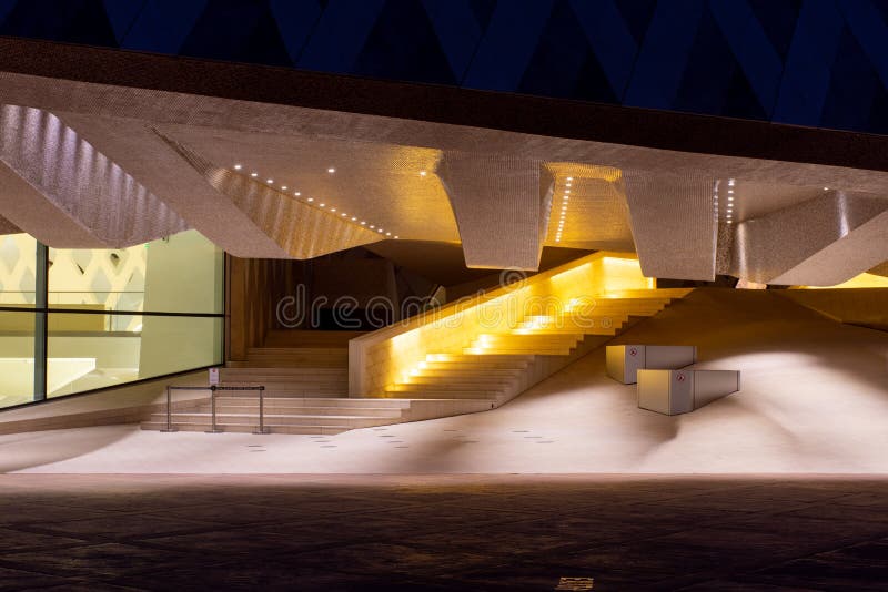 The Al Ain Zoo Sheikh Zayed Center for education and research at night glowing modern achitecture