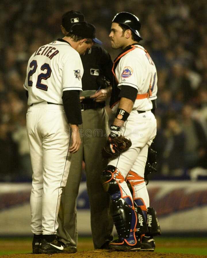 Mets pitcher Al Leiter and catcher Mike Piazza speak with the home plate umpire. (Image taken from color slide.). Mets pitcher Al Leiter and catcher Mike Piazza speak with the home plate umpire. (Image taken from color slide.)