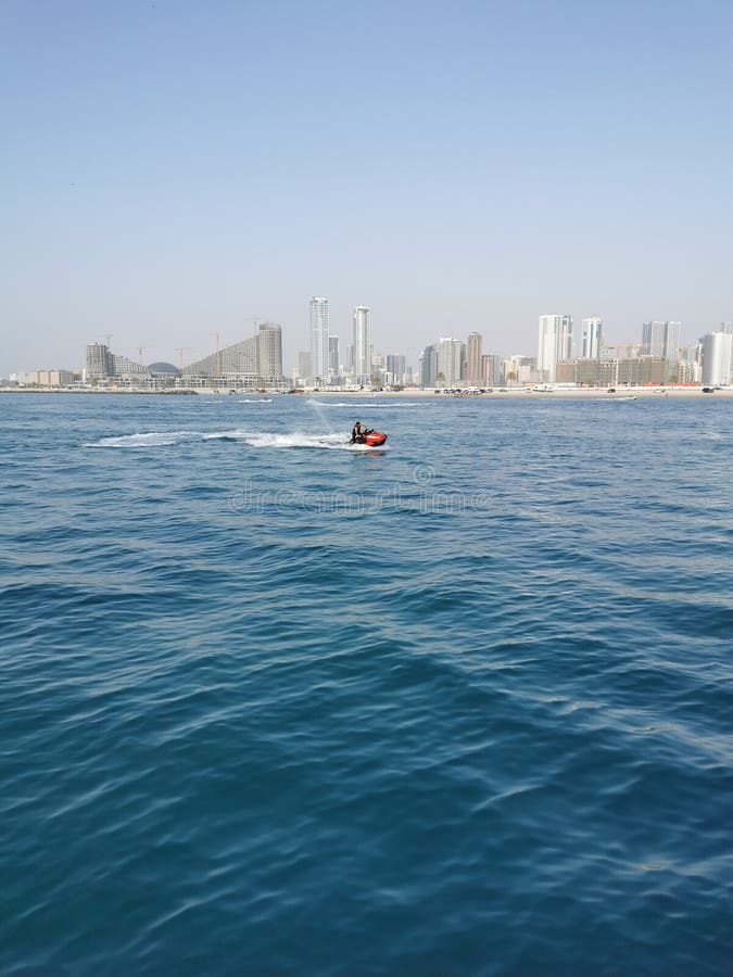 Al mamzar park beach with sharjah in background