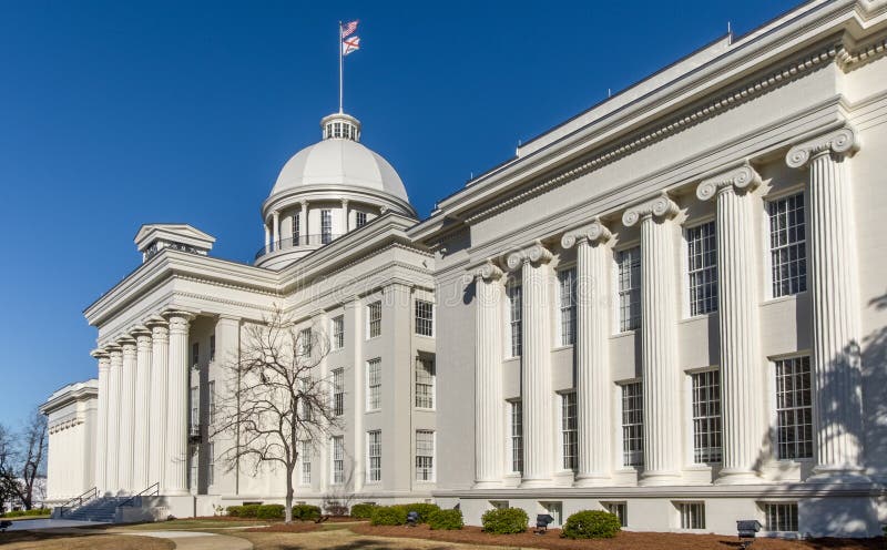 Alabama State Capitol Building. Flags flying atop the dome of the Alabama State Capitol Building in Montgomery stock images Alabama State Capitol Building. Flags flying atop the dome of the Alabama State Capitol Building in Montgomery stock images