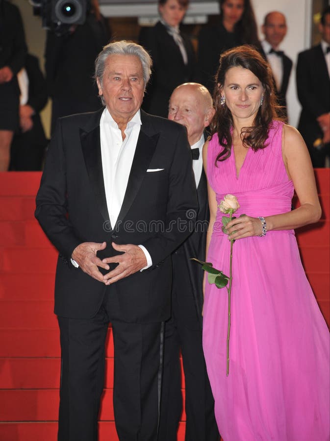 CANNES, FRANCE - MAY 25, 2013: Alain Delon & Aurelie Filippetti at gala premiere at the 66th Festival de Cannes for Only Lovers Left Alive.