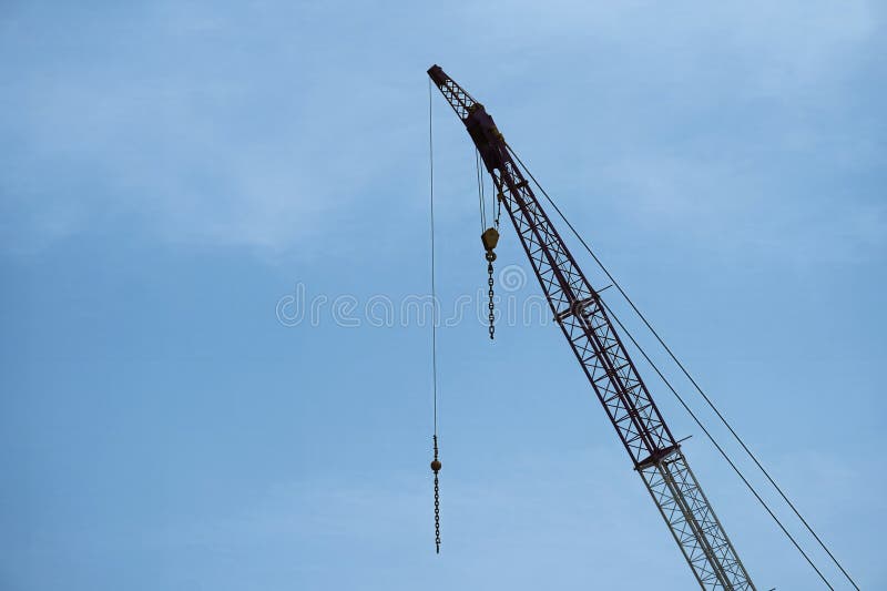 Alang, Bhavnagar, 31, August, 2024: A large ship is elevated by a crane at Alang Shipyard, representing the dismantling of royalty free stock image