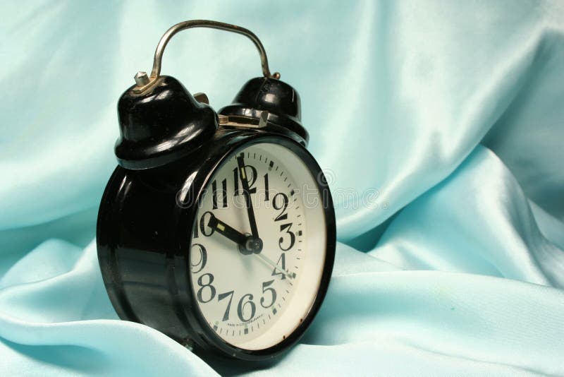 Alarm-clock on blue background