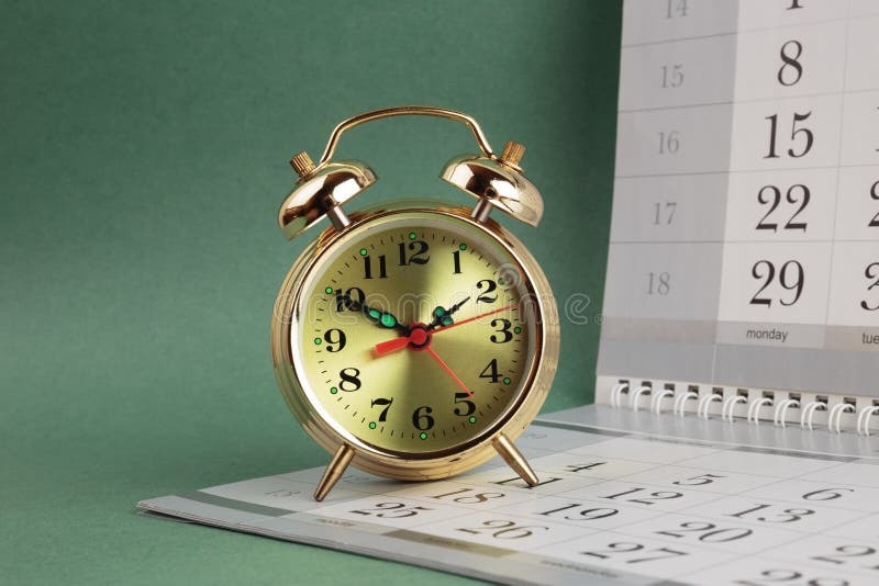 Alarm clock and calendar stock image. Image of alarm 59099955