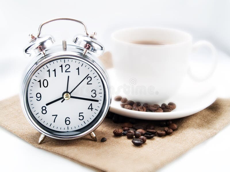 Alarm clock and coffee cup