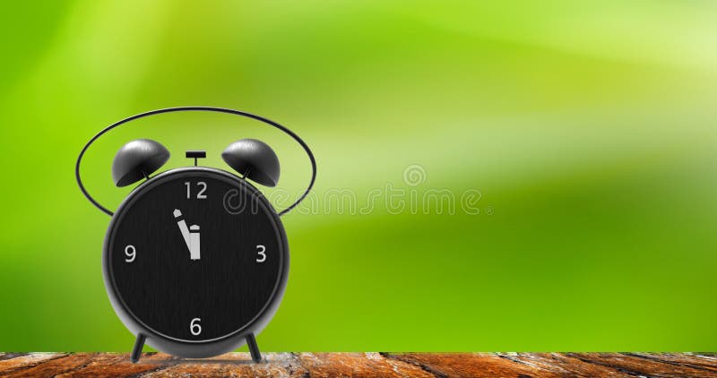 Alarm clock with little minutes to twelve o`clock royalty free stock photo