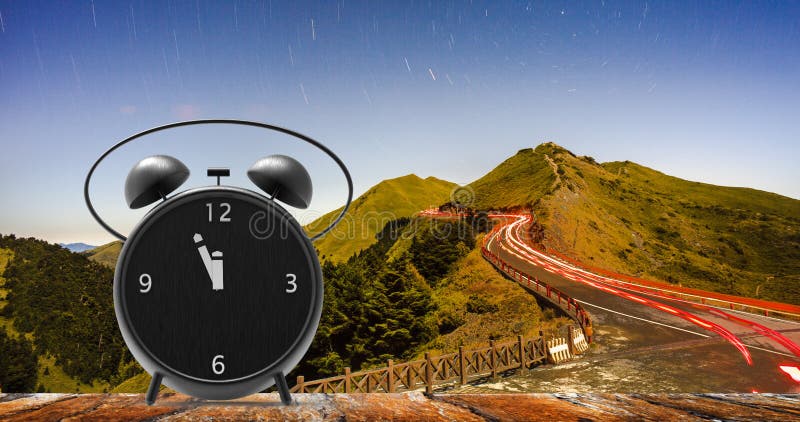 Alarm clock with little minutes to twelve o`clock royalty free stock photos