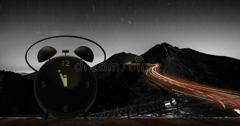 Alarm clock with little minutes to twelve o`clock royalty free stock images