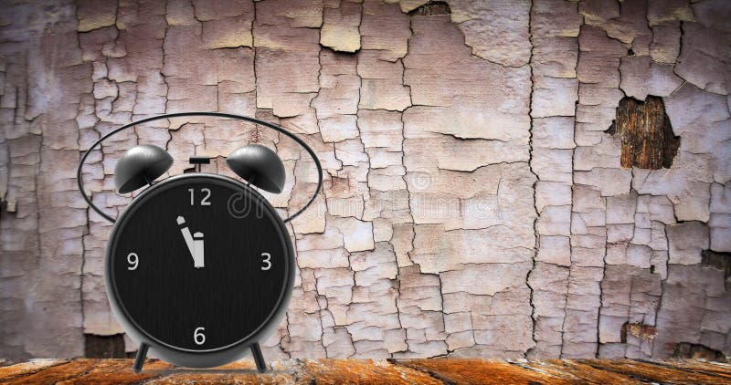 Alarm clock with little minutes to twelve o`clock stock photography
