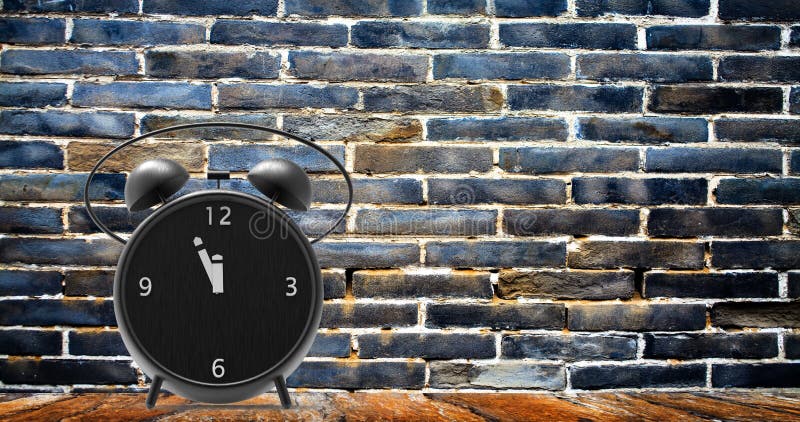 Alarm clock with little minutes to twelve o`clock stock images