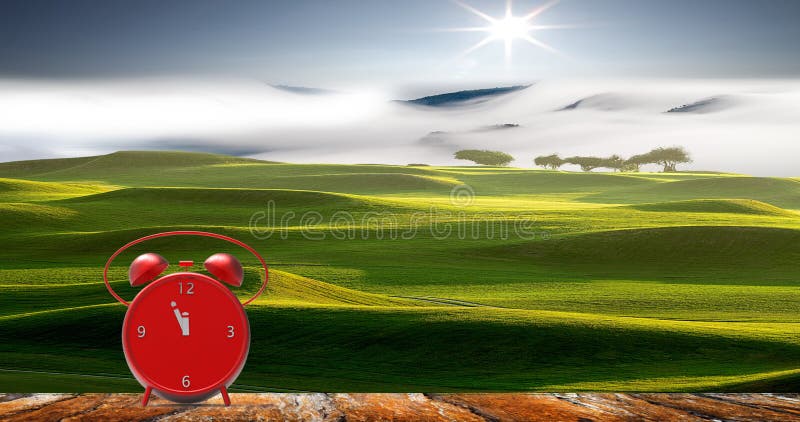 Alarm clock with little minutes to twelve o`clock royalty free stock image