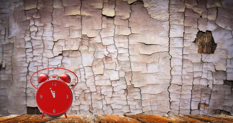 Alarm clock with little minutes to twelve o`clock stock image