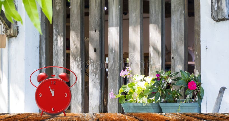 Alarm clock with little minutes to twelve o`clock royalty free stock photos