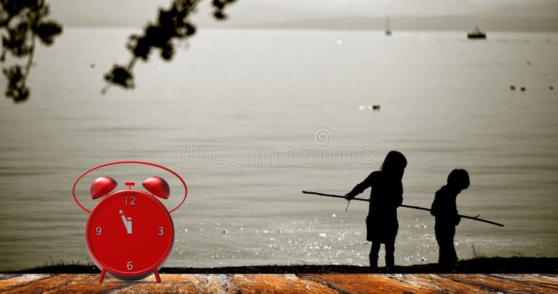 Alarm clock with little minutes to twelve o`clock royalty free stock photo