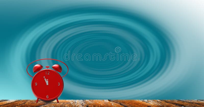 Alarm clock with little minutes to twelve o`clock royalty free stock photo