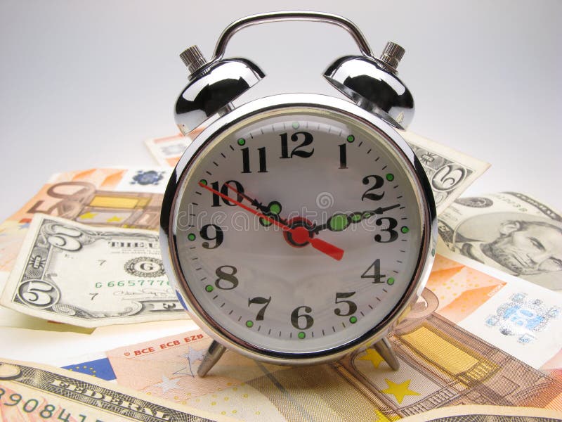 Alarm clock and money stock image. Image of financing 3881263