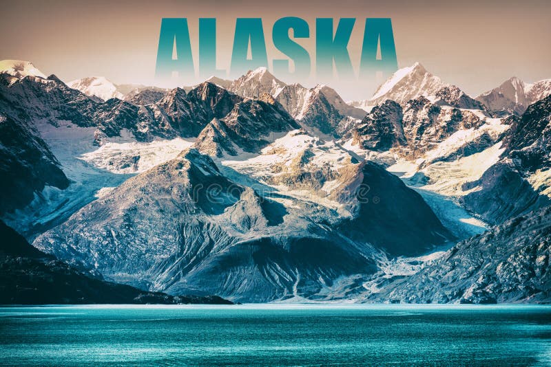 Alaska Glacier Bay landscape National Park, USA. Alaska text written as title above mountain top for cruise destination. Background of snow capped mountains