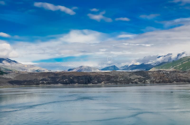 Alaska landscape mountains and water, aerial perspective view. Mountains reflection in the water. Remote location