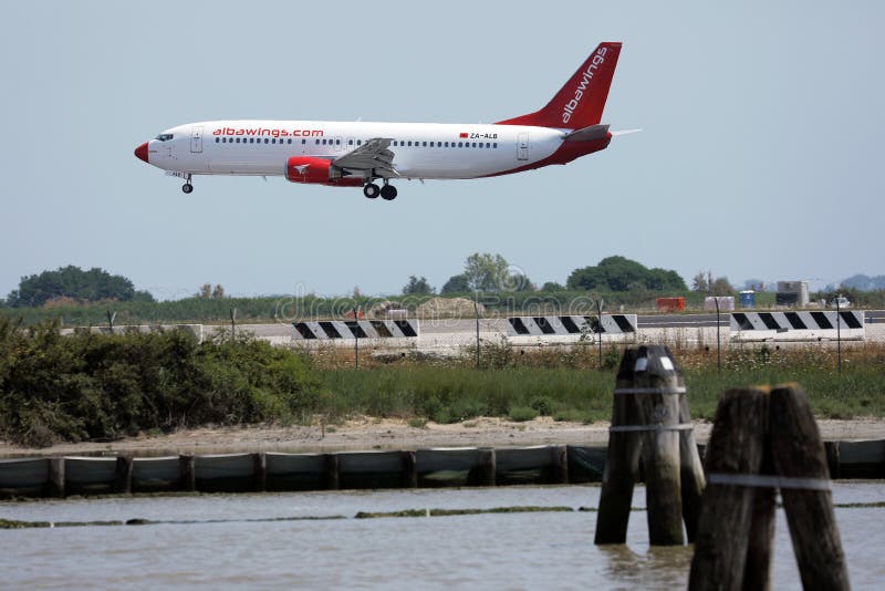 Albawings plane landing on Marco Polo Venice Airport, VCE