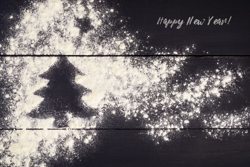Albero di Natale dipinto con farina su un fondo di legno scuro Nuovo anno, cartolina d'auguri di Natale immagini stock libere da diritti Albero di Natale dipinto con farina su un fondo di legno scuro Nuovo anno, cartolina d'auguri di Natale immagini stock libere da diritti