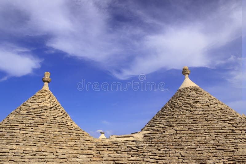 Alberobello som är forntida, apulia, arkitektoniska detaljer, arkitektoniska beståndsdelar, arkitektonisk gräsplan, arkitektur, k royaltyfria bilder Alberobello som är forntida, apulia, arkitektoniska detaljer, arkitektoniska beståndsdelar, arkitektonisk gräsplan, arkitektur, k royaltyfria bilder
