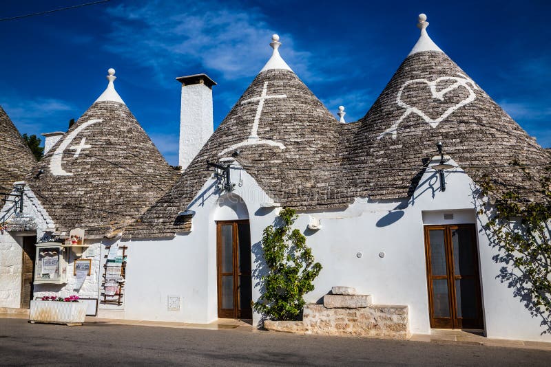 Alberobello с домами Trulli - Apulia, Италия стоковая фотография rf Alberobello с домами Trulli - Apulia, Италия стоковая фотография rf