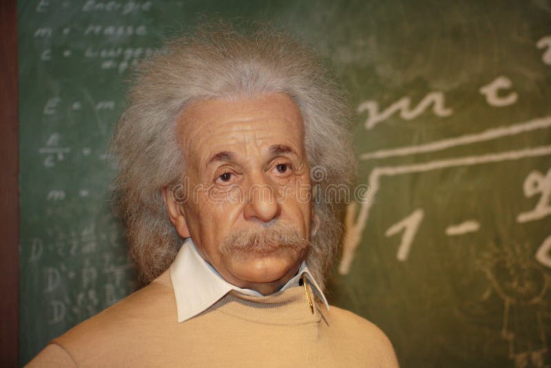 Albert Einstein wax model standing at blackboard