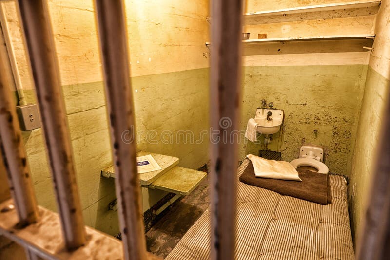 A view inside of Alcatraz prison showing a prison cell. A view inside of Alcatraz prison showing a prison cell.