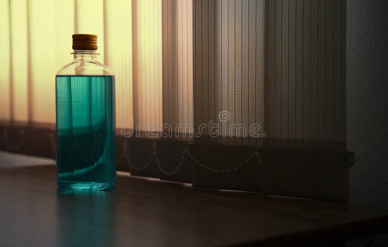 Alcohol Bottle for Refill on Table with Copy Space in COVID19 Stock