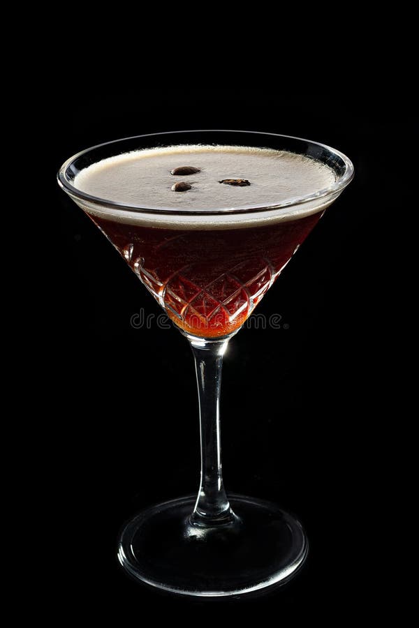 Alcohol cocktail Espresso Martini cocktails garnished with coffee beans on black background.