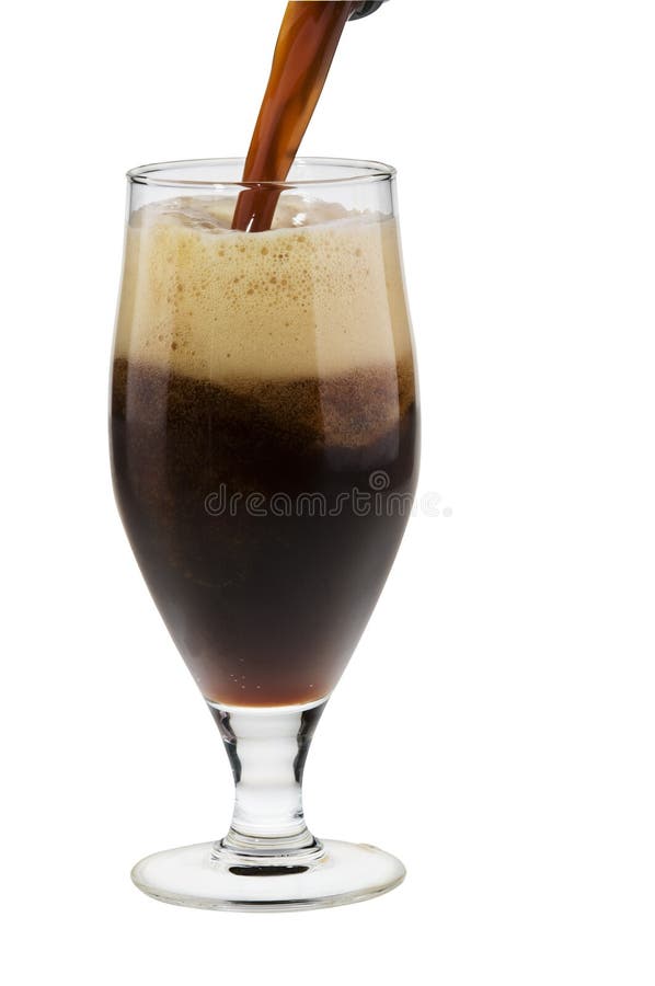 Alcohol dark beer with froth pouring into a glass