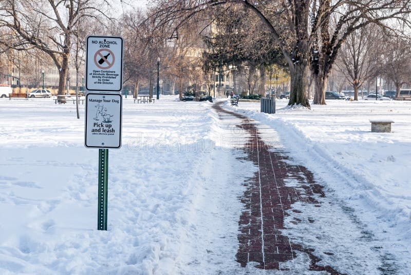 Alcohol and Dog Signs in a City Park Winter Stock Photo Image of