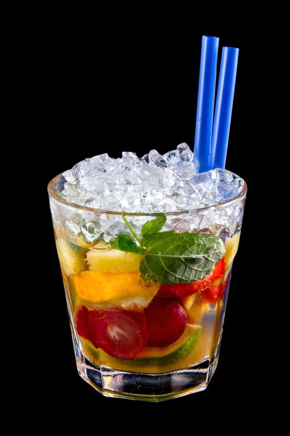 Alcohol drink, cocktail with fruits, ice, isolated black royalty free stock image Alcohol drink, cocktail with fruits, ice, isolated black royalty free stock image