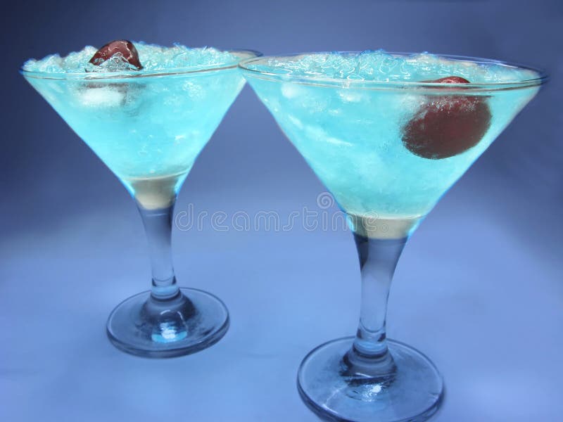 Alcohol liqueur blue curacao cocktails with cherry