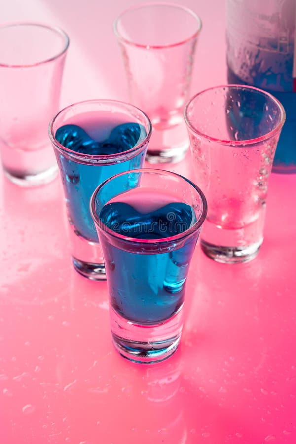 Alcohol in shot glasses stock image. Image of fluid, drop 51012505