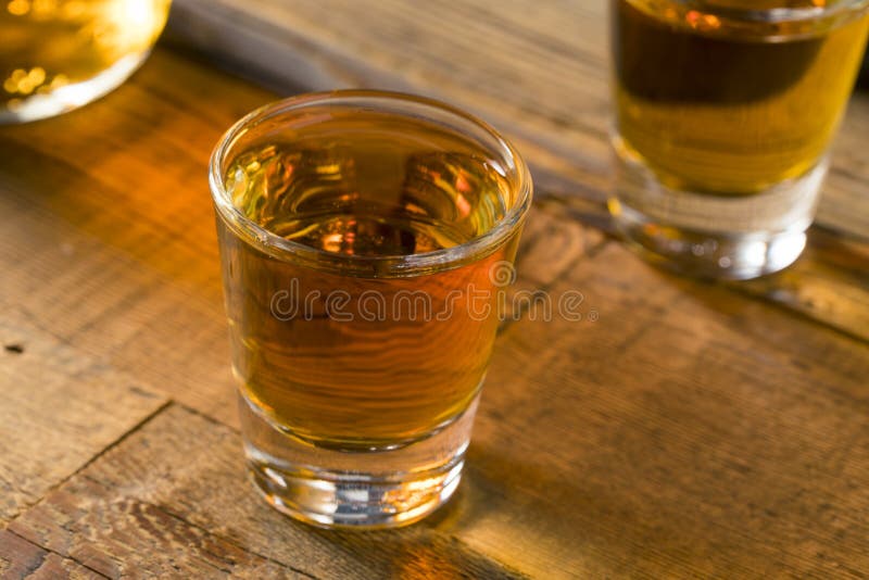6,811 Alcoholic Brown Rum Shot Glass Stock Photos Free & RoyaltyFree
