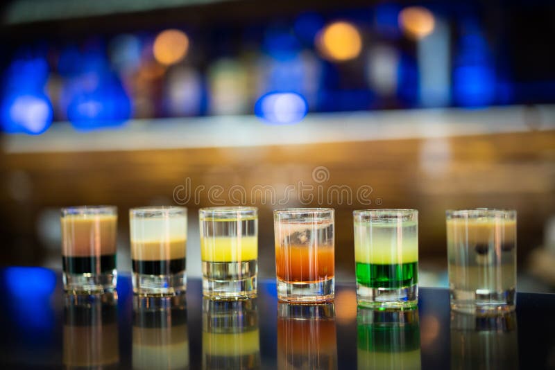 Alcoholic Shots at the Bar. Stock Photo Image of night, closeup