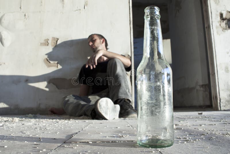 Alcoholic Sitting on the Floor. Alcoholic Sitting on the Floor