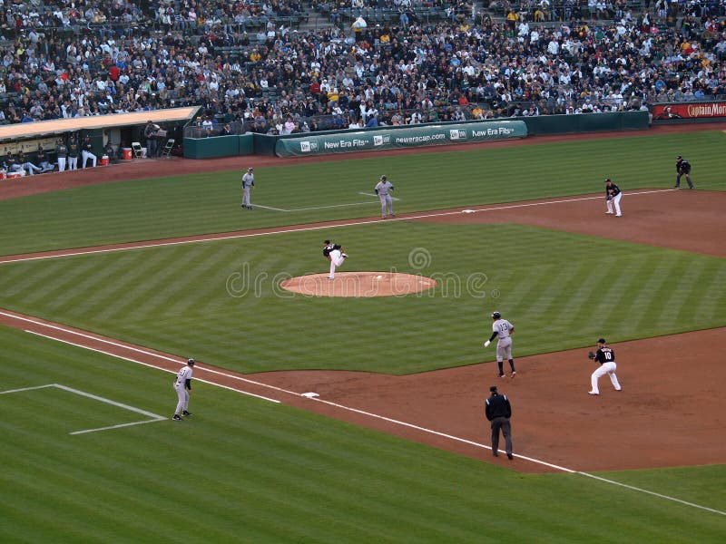 OAKLAND, CA - JULY 7: Yankees 6 vs A's 2: runners Yankee lead at 1st, Alex Rodriguez, and 3rd, Nick Swisher, as As Gio Gonzalez throws pitch Taken July 7 2010 at the Coliseum in Oakland California. OAKLAND, CA - JULY 7: Yankees 6 vs A's 2: runners Yankee lead at 1st, Alex Rodriguez, and 3rd, Nick Swisher, as As Gio Gonzalez throws pitch Taken July 7 2010 at the Coliseum in Oakland California