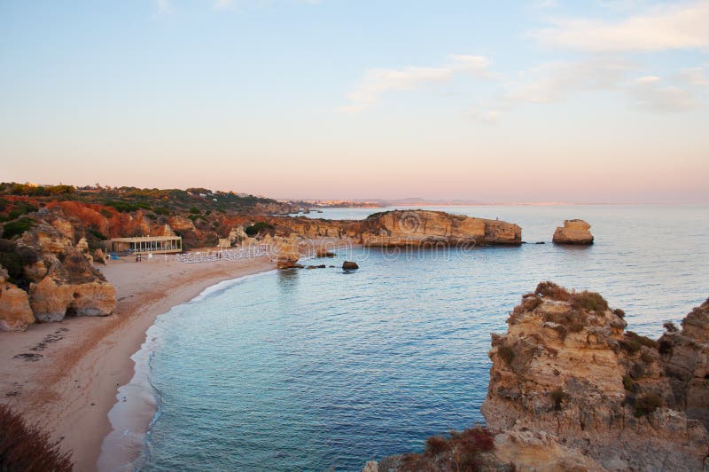 Algarve coast, Portugal. Cliffs and beach at sunset royalty free stock photo Algarve coast, Portugal. Cliffs and beach at sunset royalty free stock photo